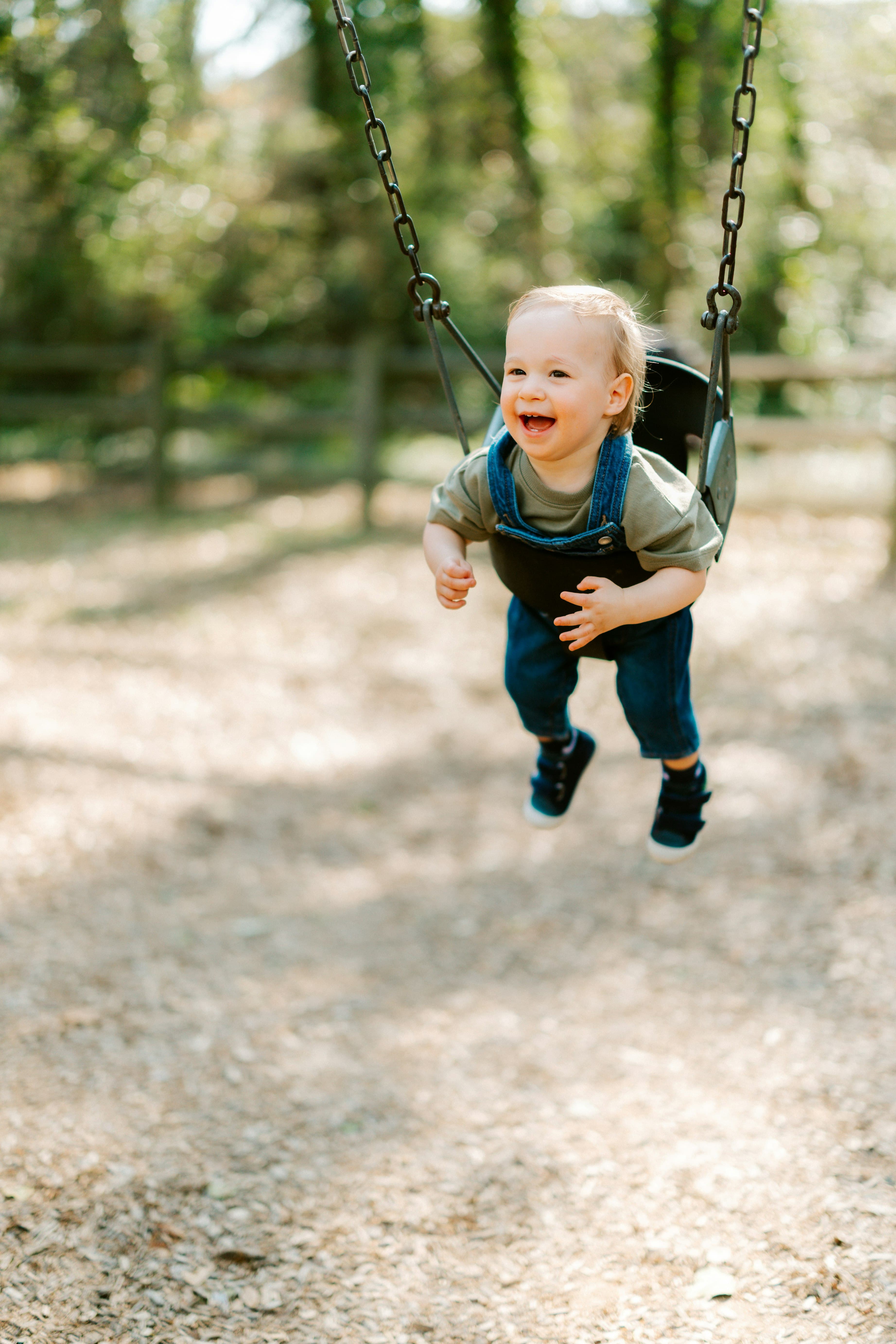 Child on a garden swing saved as a Littley memory